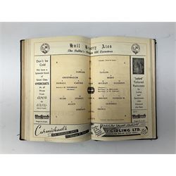 Hull City A.F.C. - two bound volumes of 1940s home match programmes; volume one 1946-7 season containing twenty-six programmes from 31/8/46 to 7/6/47 including Hull City Boys game 5/4/47 against Leicester Boys; volume two 1947-8 season containing twenty-five programmes including Raich Carter's first game 3/4/48 having taken over as player/manager 1/4/48. Uniformly bound in black half leather. Provenance: By direct descent from the family of Raich Carter having been consigned by his daughter Jane Carter.