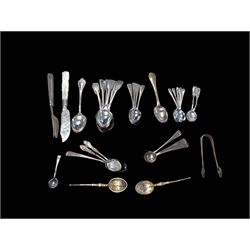 Collection of silver teaspoons, including souvenir and American silver examples, together with a silver handled fork and a mother of pearl handled silver knife, all stamped or hallmarked 