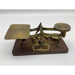 Brass postage scales on rectangular wooden base, together with weights, H9.5cm, L18.5cm