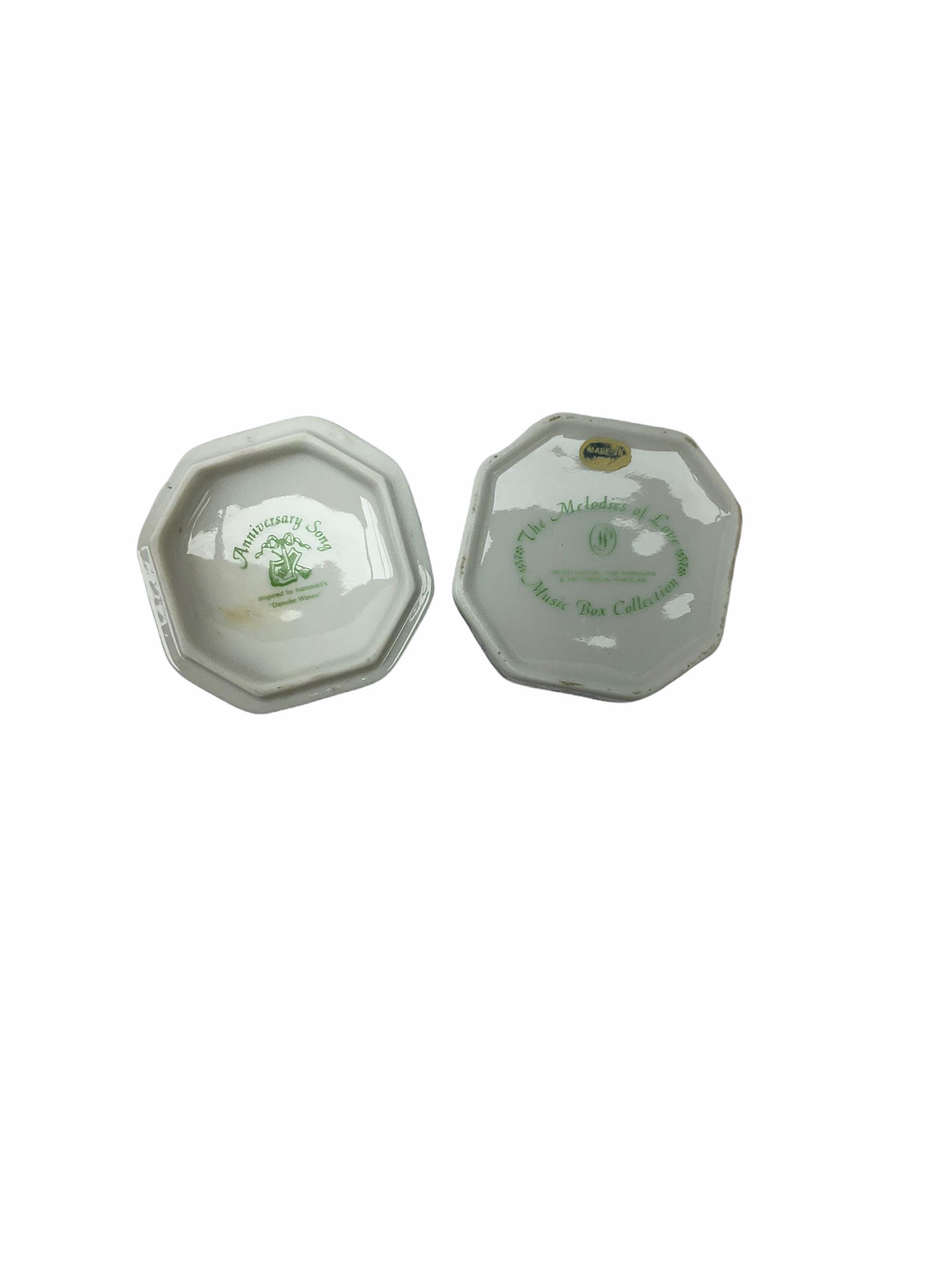 The Melodies Of Love Franklin porcelain Music Box Collection, to include 'I love you', 'Till the end of time', and 'Tonight we love', eight in total, together with Franklin porcelain 'Japanese' tea cups of 12 months, in stand. 