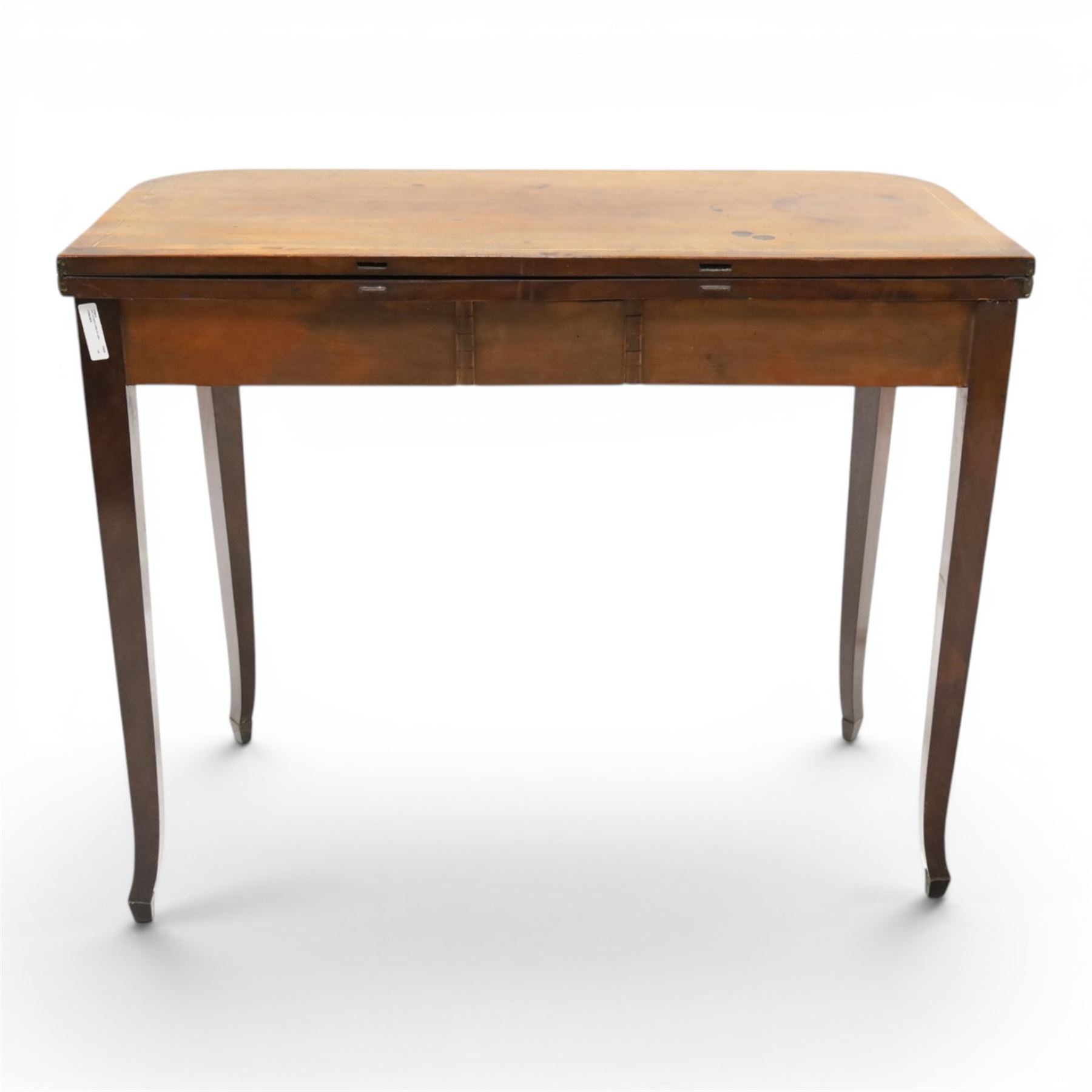 George III mahogany tea-table, the D-shaped rectangular fold-over top with satinwood stringing, raised on elegant square tapering and splayed supports with spade feet and gate-leg action