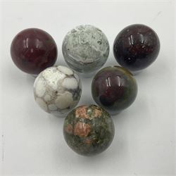 Six mineral specimens spheres, comprising jasper red, spotted agate, unakite, sardonyx, petrified wood and bloodstone, D2cm