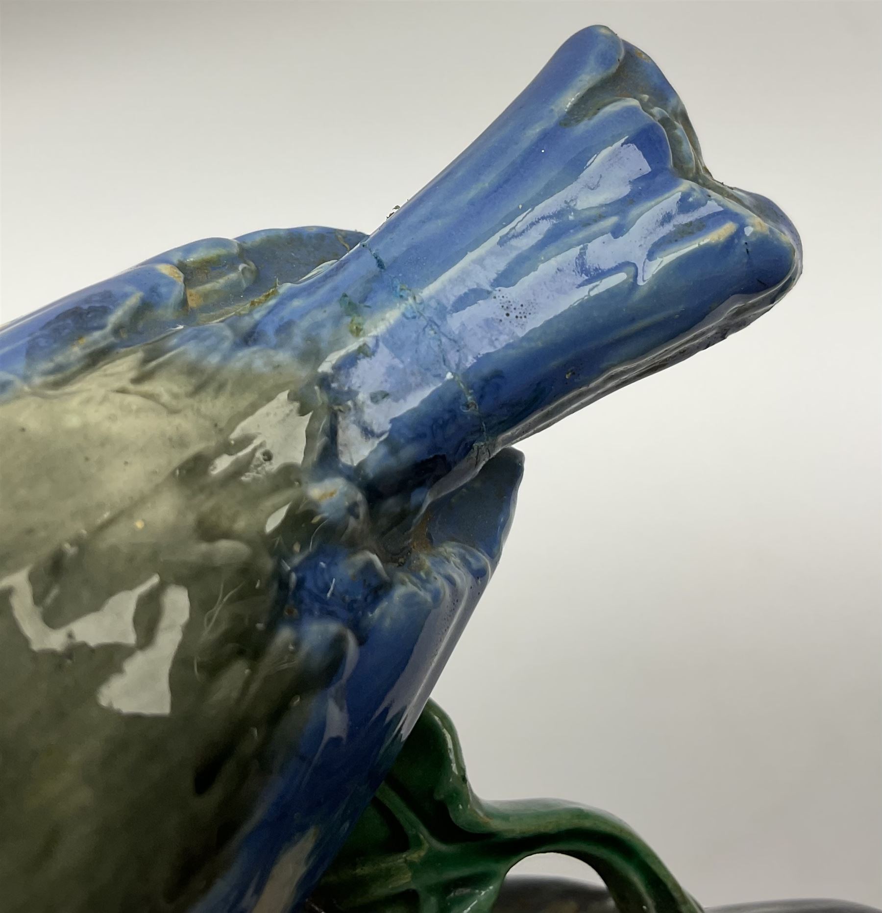 Minton majolica leaf dish, modelled as a Blue Tit perched on a branch with acorns and an oak leaf, date cypher for 1868, impressed marks beneath, L21cm. 