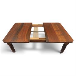 Victorian mahogany extending dining table and four chairs, rectangular top with moulded edge, extended to 198cm with additional leaf and winder, fluted and turned supports raised on castors, the chairs with swept frame and overstuffed seat, raised on cabriole front supports