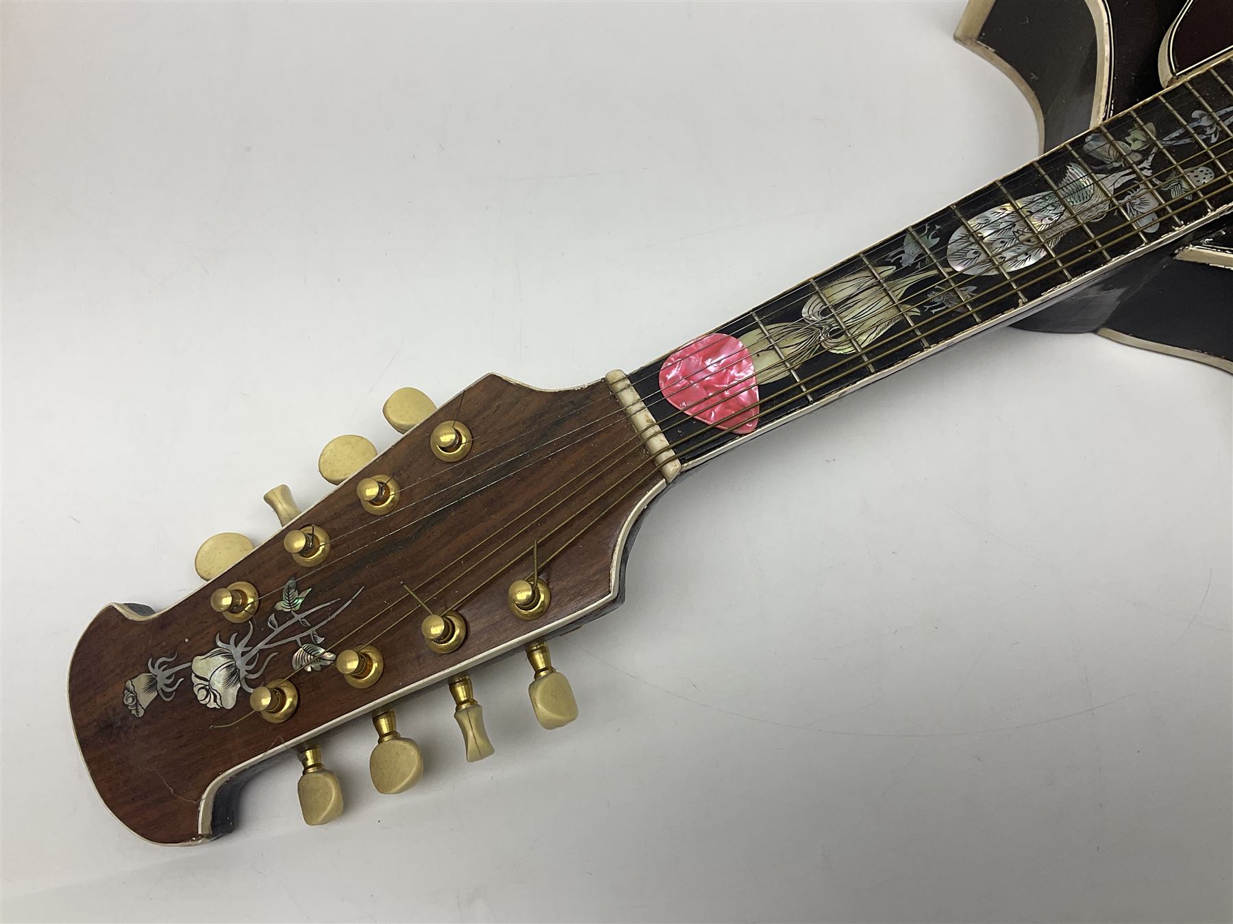 Eastern eight-string mandolin with sunburst finish and mother-of-pearl inlay L68.5cm; and another Harmony mandolin with cracked headstock (2)