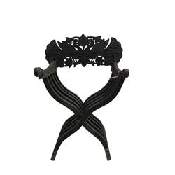 Heavily carved hardwood folding chair, slot-in back carved and pierced with foliate decoration
