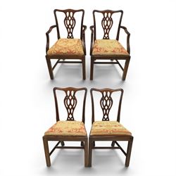 Large 19th century mahogany extending dining table with set of Chippendale design chairs, extending dining table with rectangular moulded top additional three leaves, raised on turned supports terminating in brass castors, the dining chairs (2 + 2) with shaped cresting rail and pierced splats, raised on square supports with stretchers