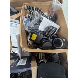 Collection of photography equipment, including flashes, hoods, filters, telephoto lens, bags, etc