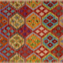 Turkish Anatolian flatweave kilim runner, ivory field decorated with rows of large polychrome lozenge medallions enclosing stylized geometric motifs with angular stepped borders, fringe ends 