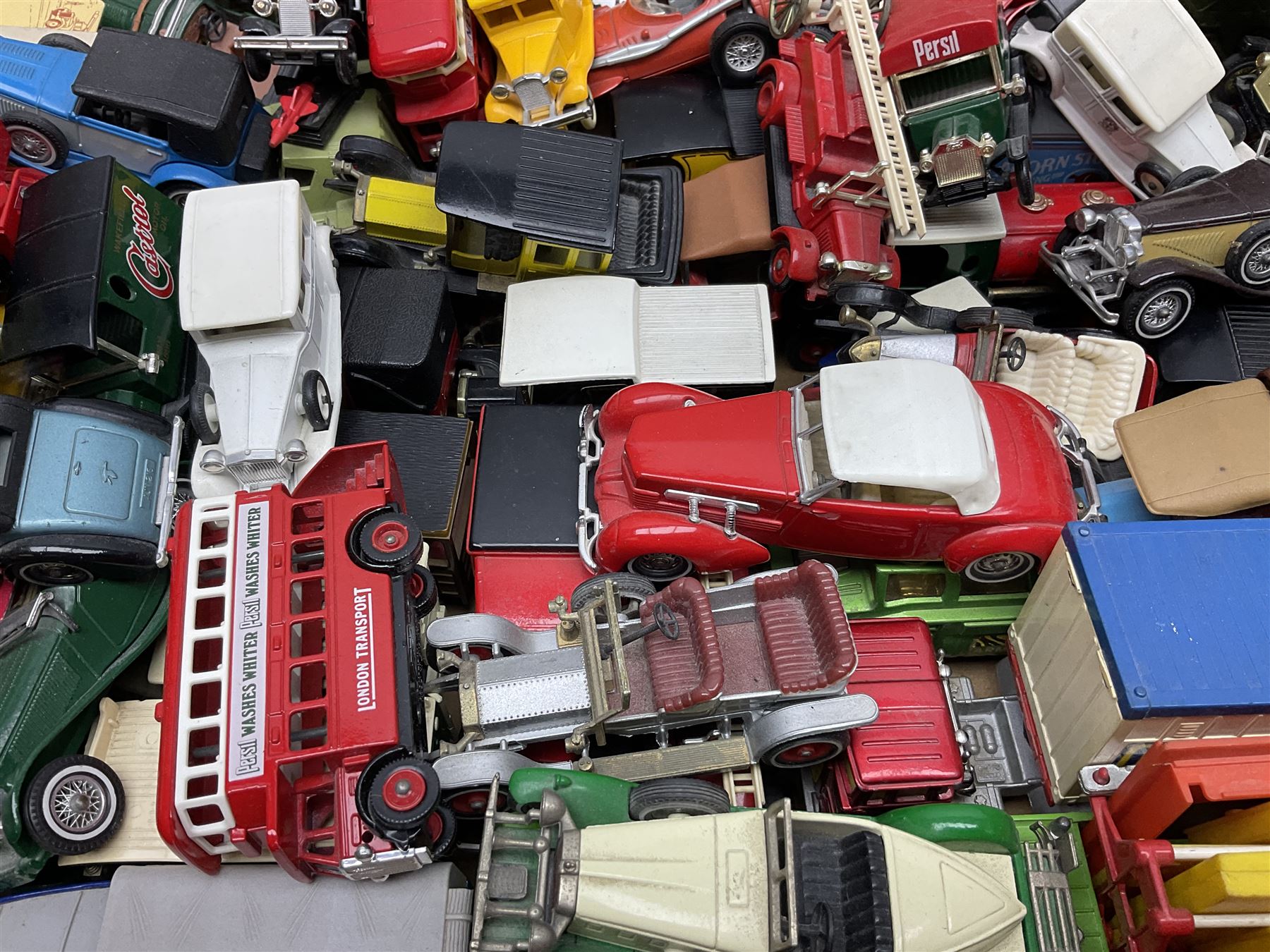 Over fifty modern die-cast models, predominantly Matchbox, including cars, promotional  and commercial vehicles; and a quantity of flat-packed model boxes