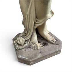 Composite stone garden figure of a scantily clad lady