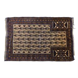 Afghan Ersari hand-knotted rug, apricot field decorated with three large octagonal gul medallions filled with geometric floral motifs, flanked by small tribal devices, end fringe fraying 97x167cm, together with a Baluch prayer rug, decorated with stylized tree motifs arranged in vertical rows beneath a stepped mihrab arch with multiple narrow borders of angular tribal motifs in shades of indigo, brown, and ochre fraying to flatweave ends, 134x84cm, (2)