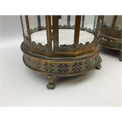 Pair of glass pane lanterns, with pierced metal decoration and a glass domed top, H60cm