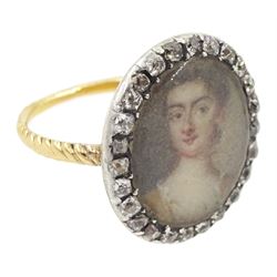 18th/ 19th century gold diamond portrait ring, set with an oval miniature of a woman on ivory, under a glazed panel, with old cut diamond surround and rope twist shank. This lot has been registered for sale under Section 10 of the APHA Ivory Act