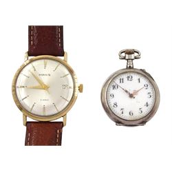 Manis gentleman's 9ct gold manual wind wristwatch, hallmarked, on tan leather strap and a silver cylinder ladies fob pocket watch, the case with embossed floral decoration