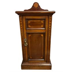 Edwardian inlaid mahogany bedside cabinet, raised back with shell inlay, the panelled cupboard door decorated with inlaid bell-flowers and satinwood stringing, on plinth base
