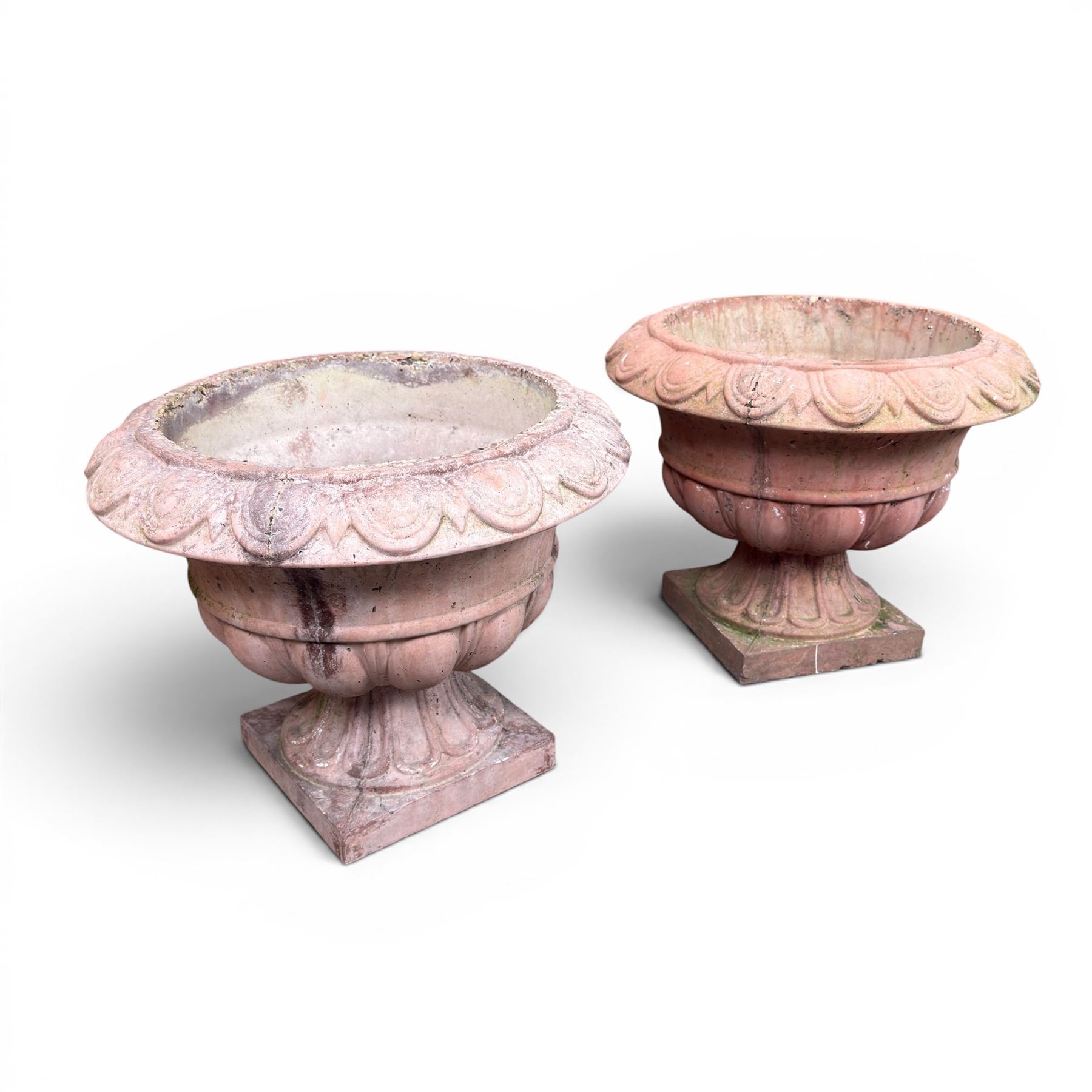 Pair of cast stone stone circular squat planters, egg and dart detail to rim, square base