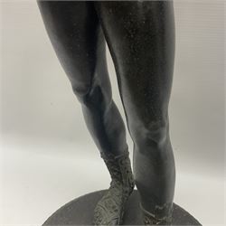 Bronzed classical nude male figure, upon a stepped circular base, H61cm 