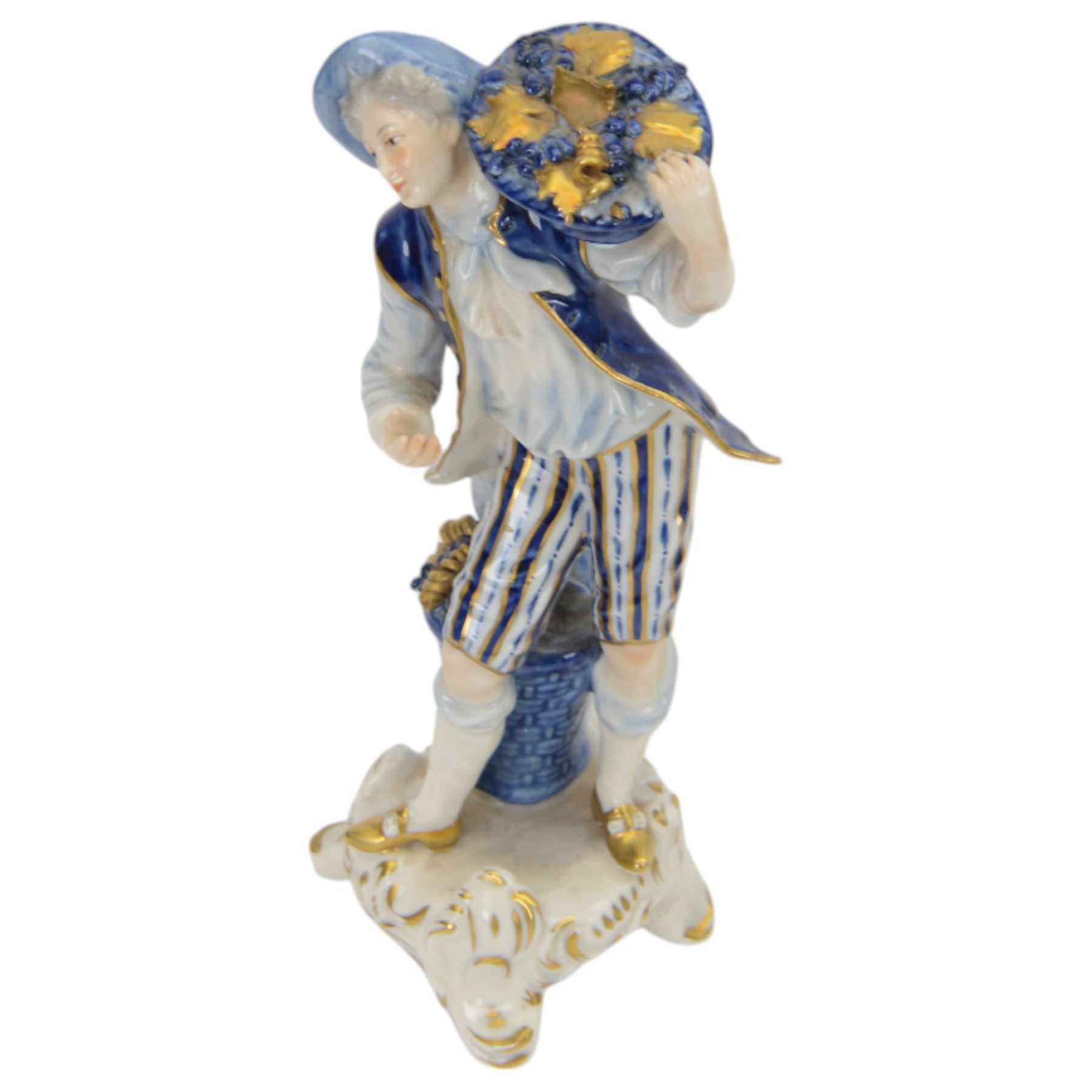 Sitzendorf figure modelled as a shepherdess, together with pair of apple sellers and other continental figures