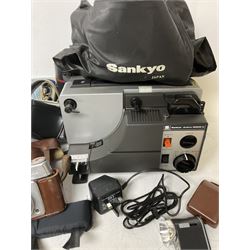 Sankyo Dualux-2000H projector, with cover, together with two vintage camera cases, etc