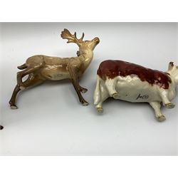 A group of figures, to include a Beswick model of a Cantering Shire Horse model no 975, Beswick foal, Beswick Herford Bull CH of Champions, Beswick stag and fawn, Roya Doulton figure group Childhood Memories First Love, Lladro polar bear, two Hummel figures, etc. 