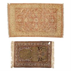 Afghan Ziegler rug, terracotta field with an all-over design of palmettes and stylized foliage in soft beige and gold tones, with a Persian Qum silk prayer rug, with a central tree of life and flowering branches and birds, within multiple floral borders, 88x125cm (2)