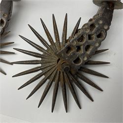 Pair of South American gaucho steel and brass spurs with twenty-two spike heel rowels, possibly Chilean L23cm