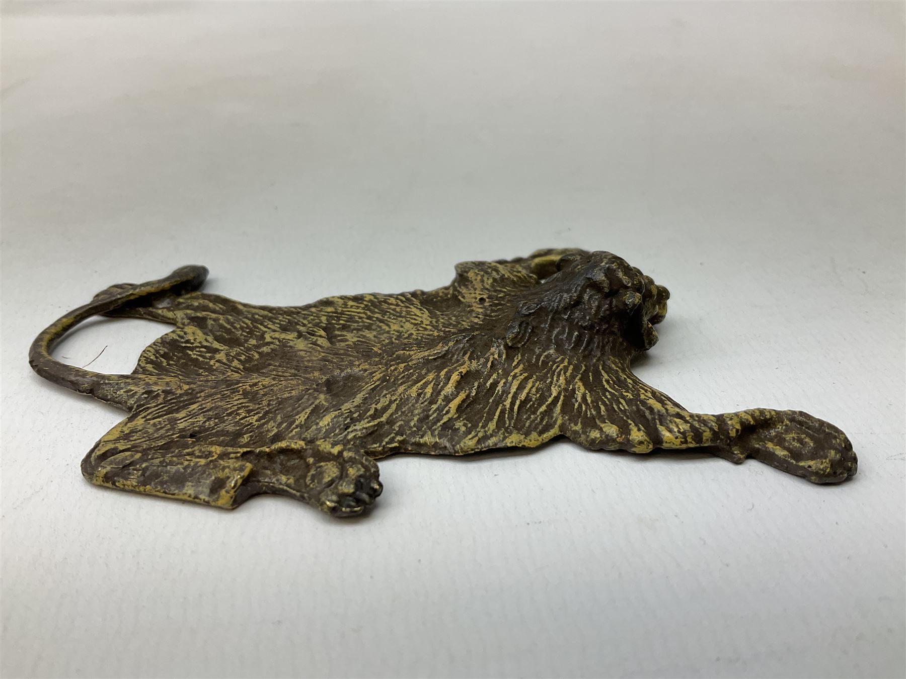 Attributed to Franz Xavier Bergman, cold painted bronze modelled as a lion skin, stamped beneath with B within an amphora and Austria, L10cm