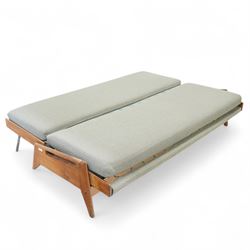 Gerard Guermonprez for Bobois - mid-century light teak sofa daybed, sides with angular teak wire sprung frame, integrated armrests with cut-out hand-holds, single fabric cushion back and seat, on out-swept tapered legs, circa 1955