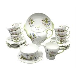 Shelley 'Wild Anemone' twenty-four piece tea service for six plus extras, comprising teapot, jug, sucrier, serving plate, seven saucers, six side plates, six teacups and another plate, all stamped with no. 13977 beneath
