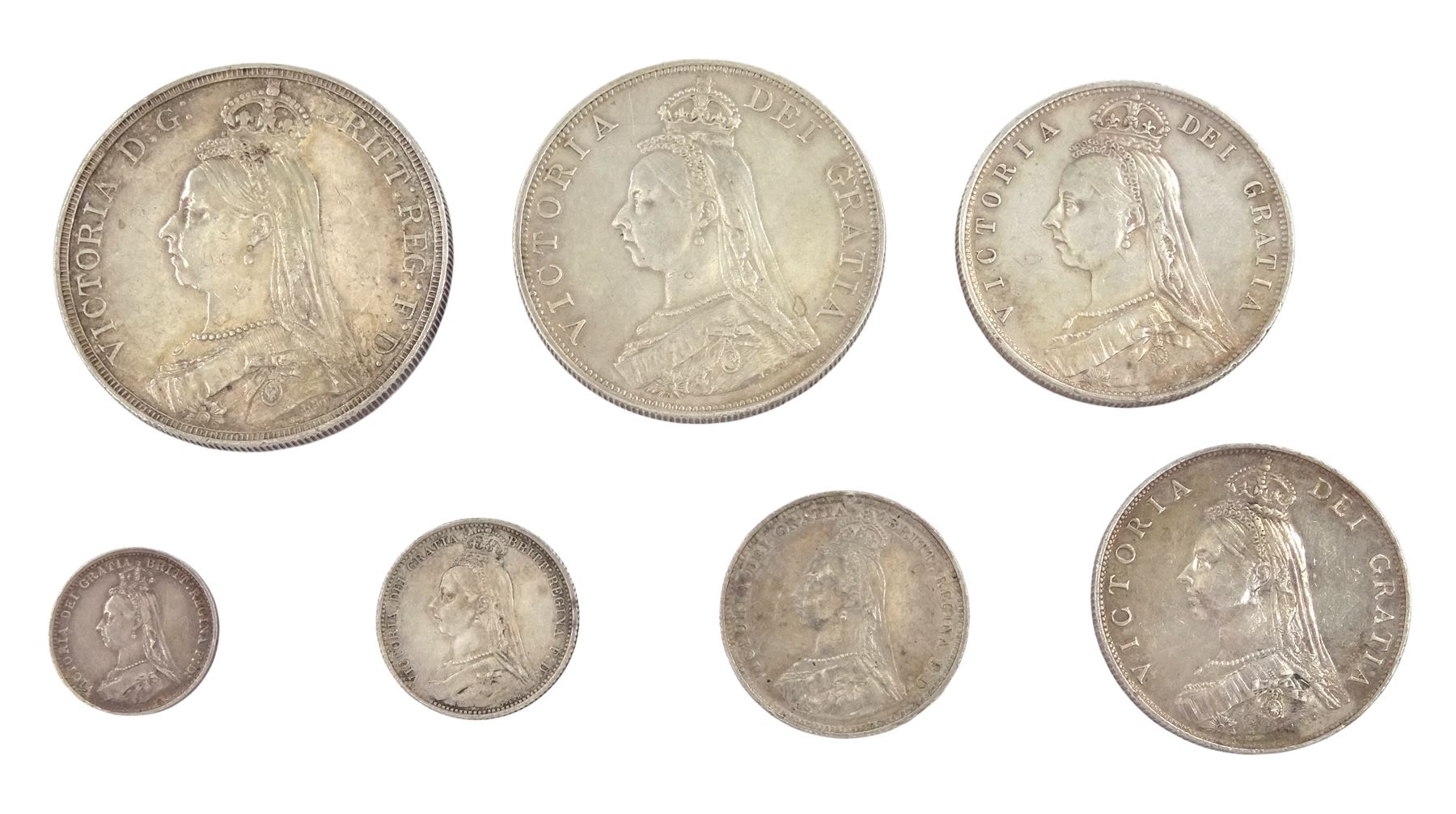 Seven Queen Victoria coins, all dated 1887, comprising threepence, sixpence, shilling, florin, half crown, double florin and crown