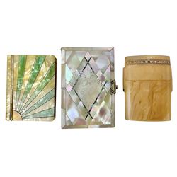 Mother of pearl and abalone inlaid card case, with central diamond shaped panel engraved with foliate decoration, together with a simulated mother of pearl card case of book form with green sun rays to cover, and simulated wood effect cigarette case with hinged lid with diamante style banding, largest L10cm