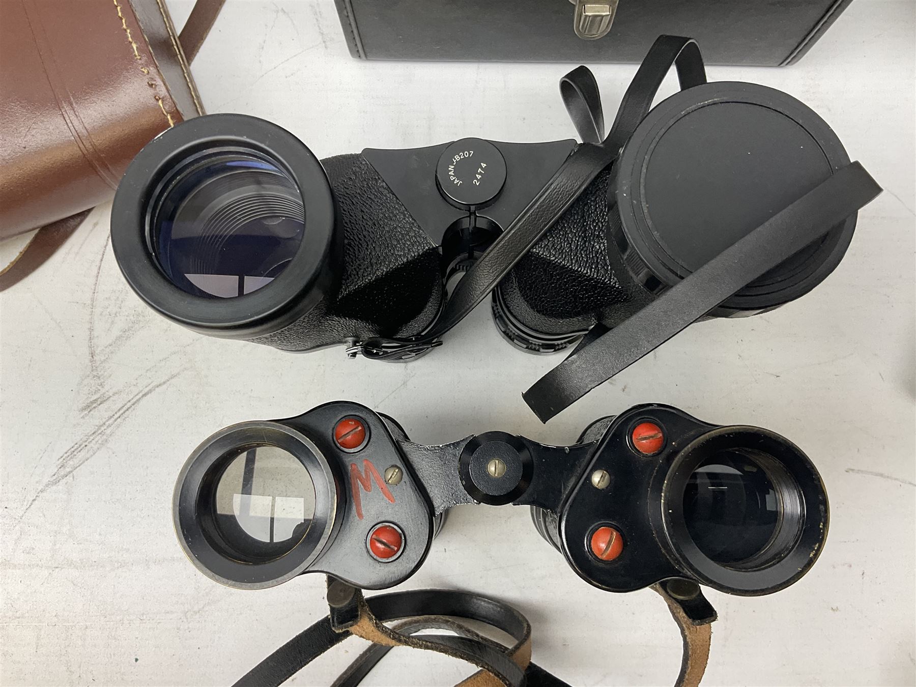 Eleven pairs of binoculars, to include Zeiss Wetzler 20x50, Taylor-Hobson Bino Prism No.2 Mk.III military stamped 1943 with broad arrow,  Swift Tecnar 16x50, J.T Coppock Oceanic Bloomed 10x50, Hensoldt Wetzlar Dialyt 7x42 etc