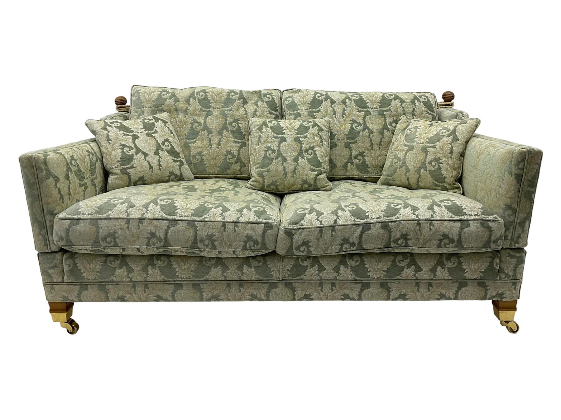 Three-piece hardwood-framed lounge suite - large two-seat Knole sofa with drop ends, upholstered in patterned fabric decorated with urns and foliage (W190cm, D117cm, H88cm); armchair upholstered in contrasting geometric pattern fabric (W83cm, D102cm, H93cm); and another armchair (W82cm, D102cm, H92cm) (3)