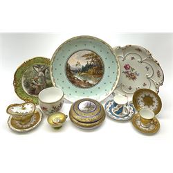 A French porcelain box and cover, of circular form printed with a central panel to the removable cover depicting a deer within a mountainous landscape, the whole heavily gilded, D16cm, together with a Coalport 'The Gilded Floral Coffee Cup' coffee can and saucer, a Dresden pot, possibly Franziska Hirsch, hand painted with courting couple and floral spray and sprigs, a Hammersley cabinet plate printed with a figural pastoral scene, a JLMenau plate of lobed form with printed foliate decoration, large cabinet plate with central printed panel of a riverside landscape, with spurious 'beehive' type mark beneath, plus 20th century Karlsbader porcelain teawares, comprising teacup and saucer, lidded sucrier and stand, and side plate, each heavily decorated in gilt, etc. 