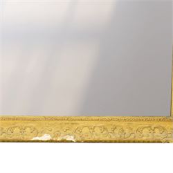 Large Louis XV style gilt framed mirror, the rectangular plate within a pierced and moulded surround decorated with foliate scrolls and flowerheads