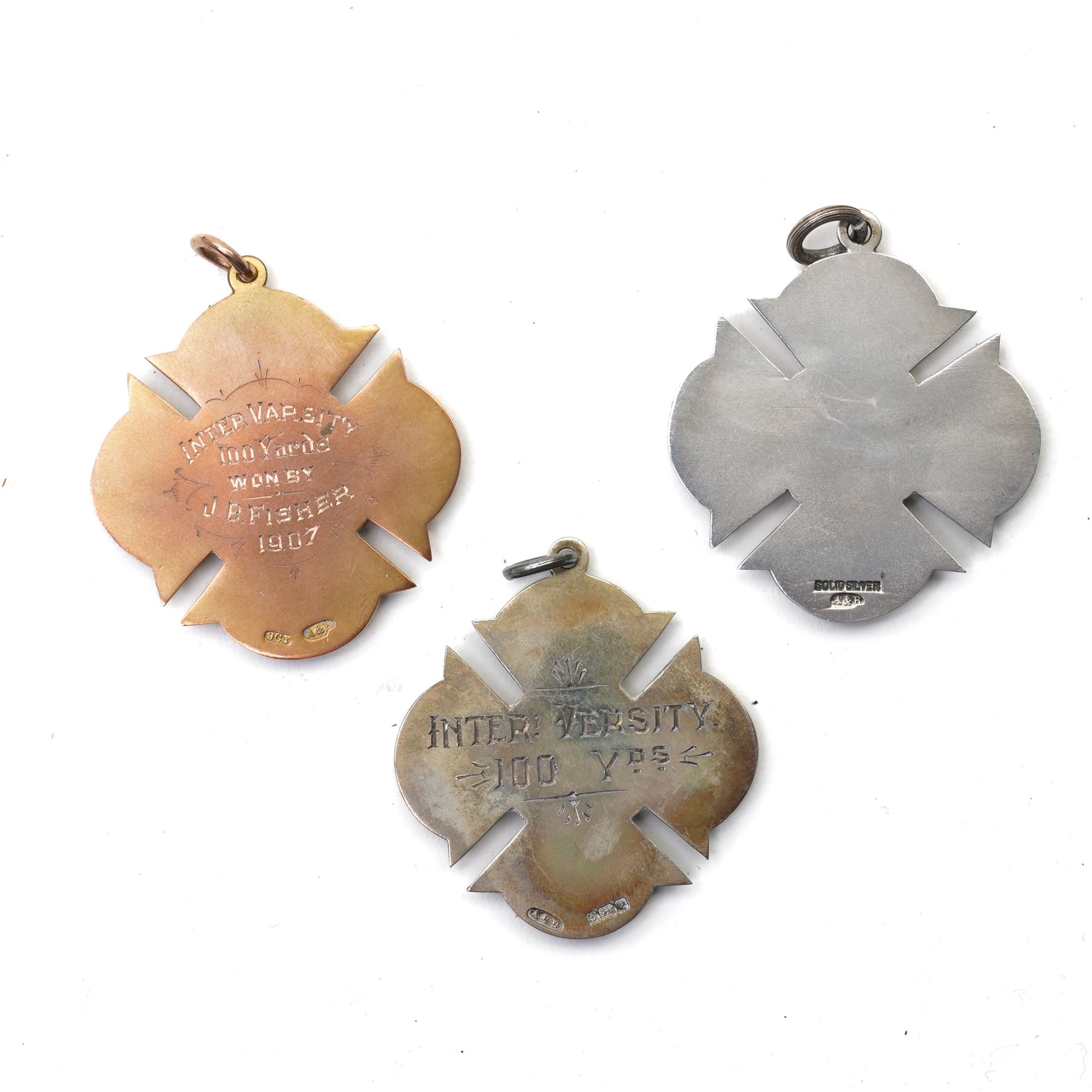 Three early 20th century sporting fob medallions, one 9ct and two silver with gold mounts, awarded to John Barugh Fisher (1888-1924) born in Amotherby, studied at Leeds University and became doctor in 1911, later Captain John Barugh Fisher R.A.M.C., two cased