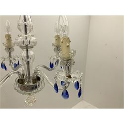 Glass four light chandelier, the baluster shaped central glass column supporting four curved branches with drip pans and blue glass drops, approx height excl fitting H50cm