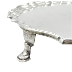 Silver shaped circular salver on three hoof feet by Hawksworth, Eyre & Co Ltd, London 1922, approx 30oz, diameter 30.5cm
