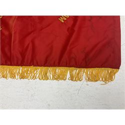 1960s North Vietnam banner embroidered in yellow thread on a red ground, roughly translates as 'Peoples Army of Viet Nam. Warriors of Viet Nam Determined To Keep The Country 1964' around a central military crest with the motto 'Warriors Keep The Country'; tassels to three sides 70 x 100cm
