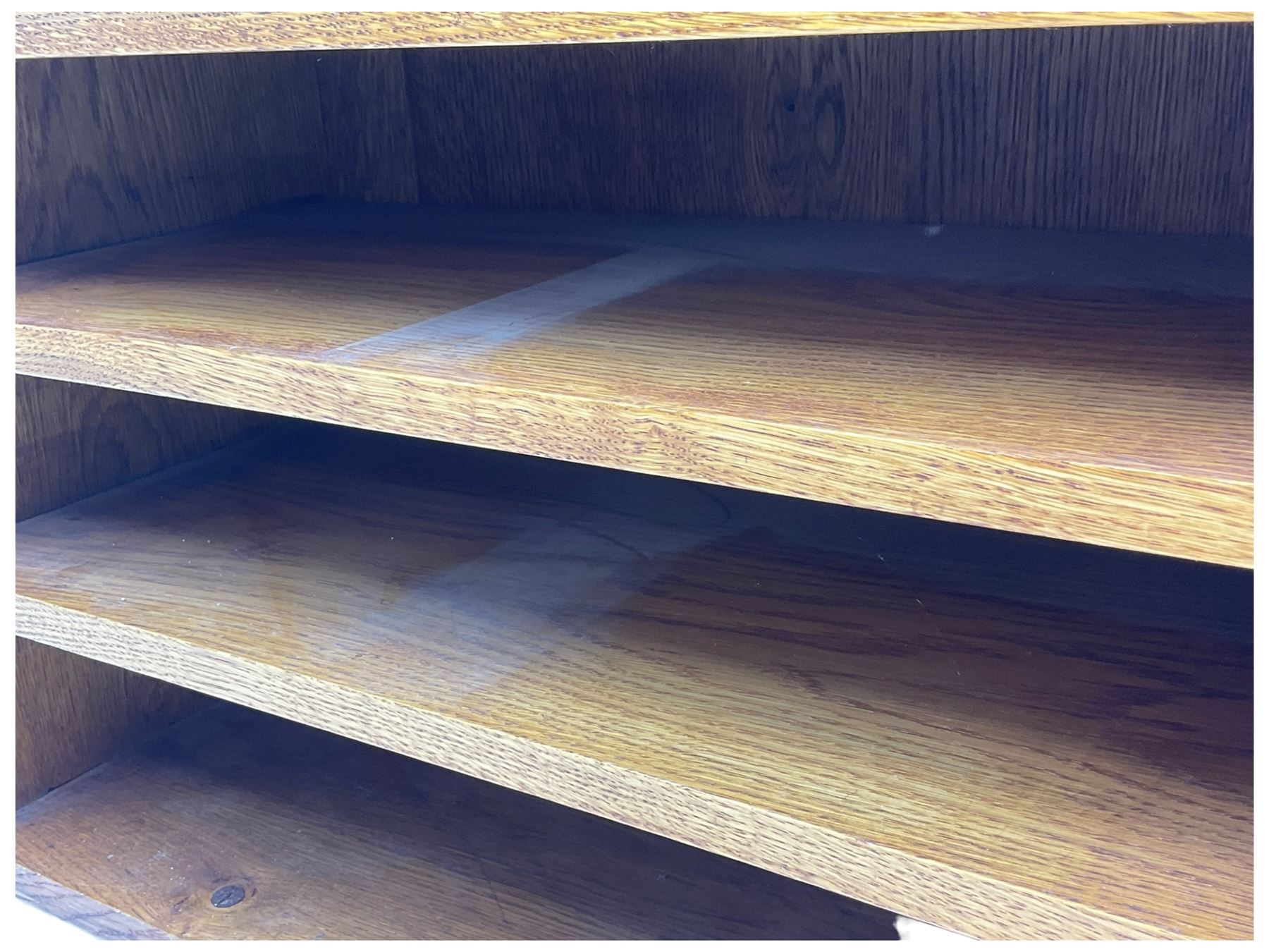 Craftsman made oak magazine table or HI-FI stand, moulded rectangular top over four shelves, flanked by two projecting holders