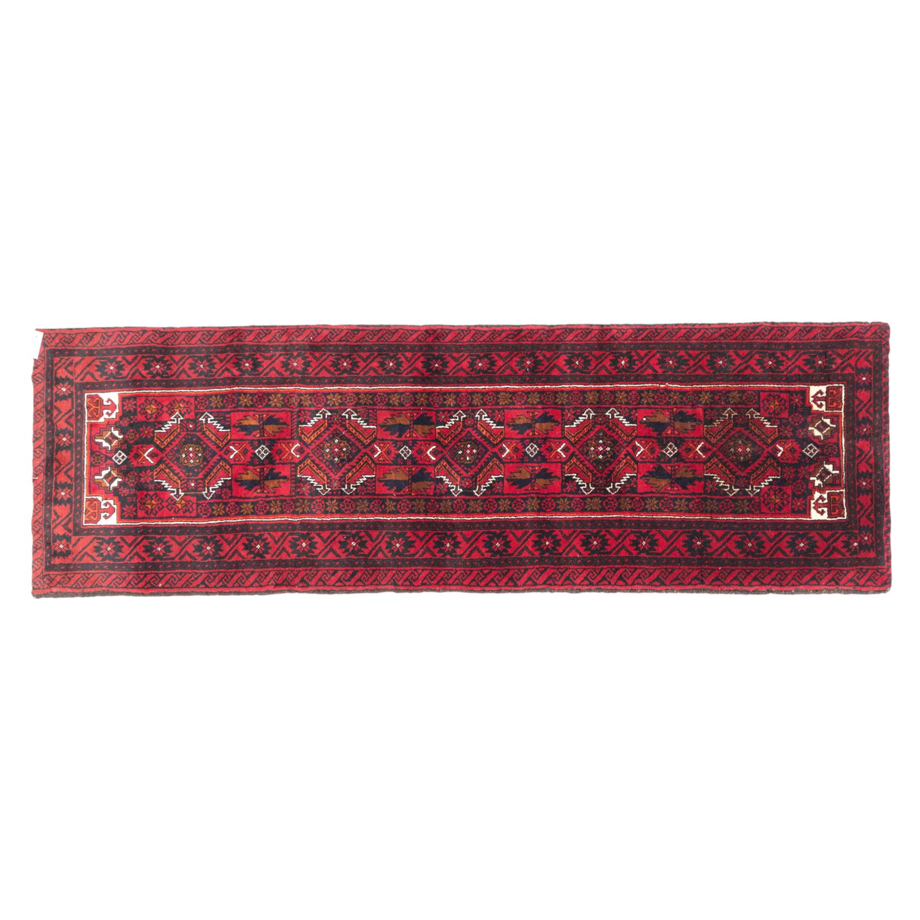 North east Persian Baluch hand-knotted runner, crimson ground with a vertical column of hooked lozenge medallions flanked by stylized leaf motifs within multiple geometric borders of rosettes and angular vines  