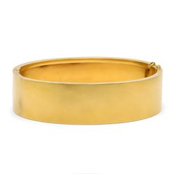 19th / early 20th century gold hinged bangle, with applied ivy leaf, bead and wirework decoration