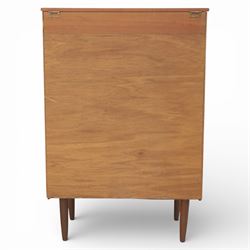 Mid 20th century teak dressing chest, rectangular top hinged to reveal a fitted interior with divisions and a rectangular mirror to the underside, over five long drawers with recessed circular handles, raised on tapering supports