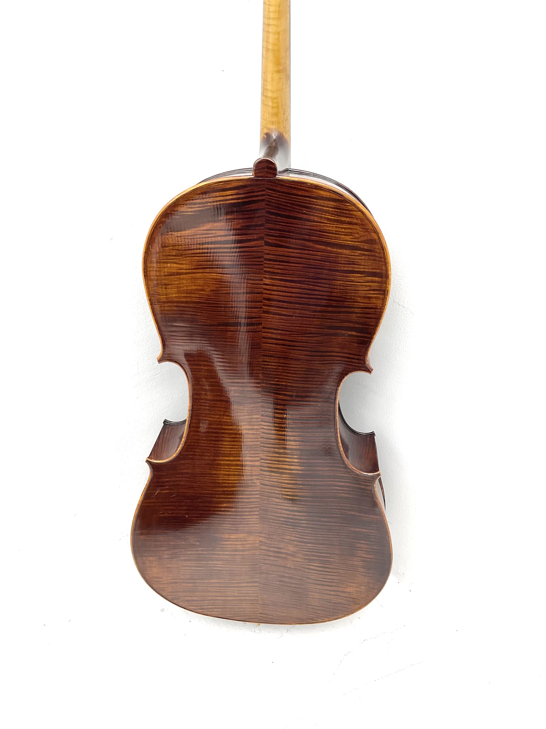 Alfred Stingl by Hofner cello, model AS-360 with 75.5cm two-piece maple back and ribs and spruce top, bears label with serial no.JO411-0706, L122cm; in carbon-fibre carrying case with bow