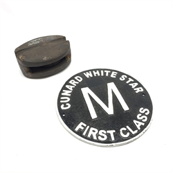 Reproduction black & white cast metal circular sign for 'Cunard White Star First Class' D25cm; and a wooden pulley block (2)