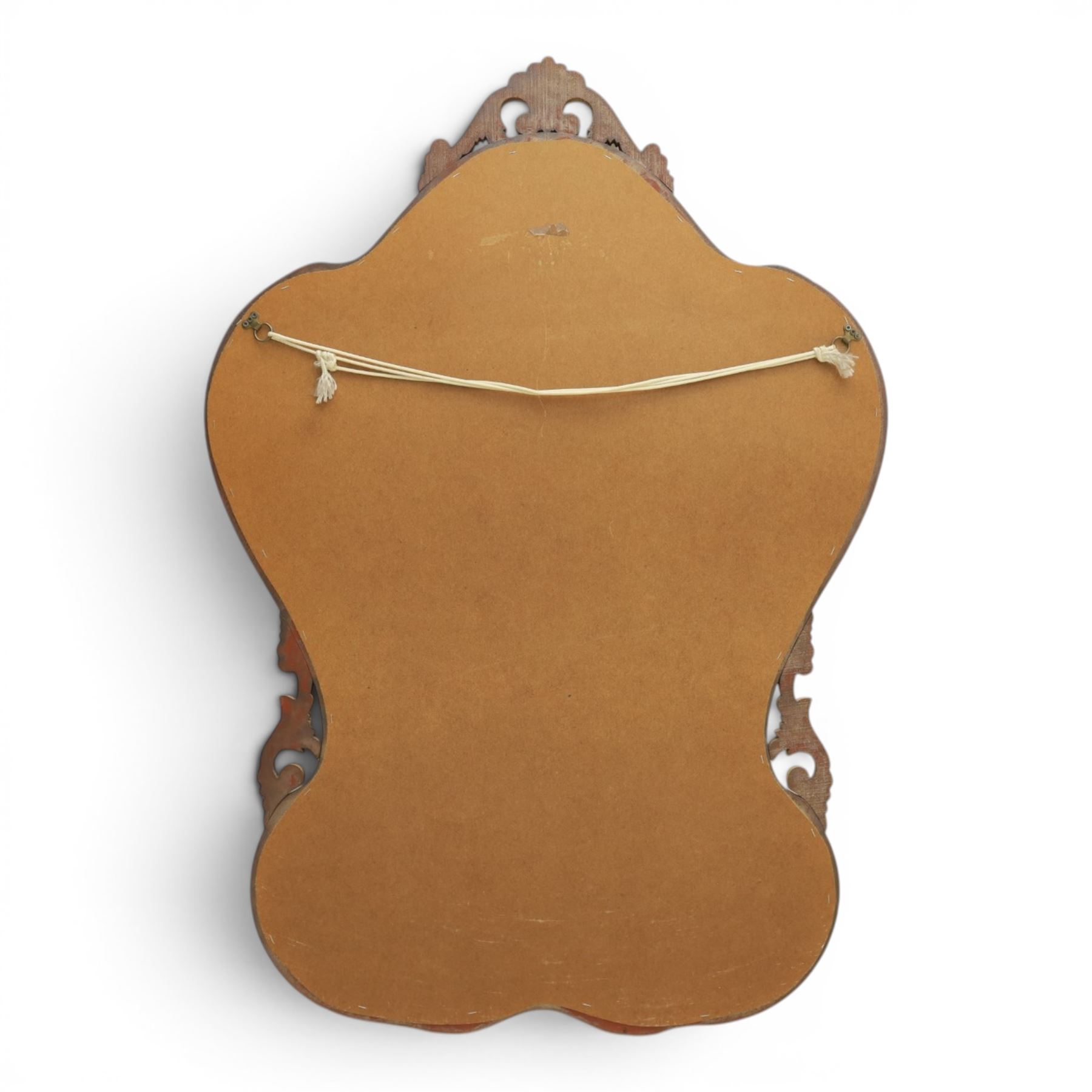Rococo design gilt wall mirror, shaped and moulded frame, serpentine lower apron, enclosing a plain mirror 