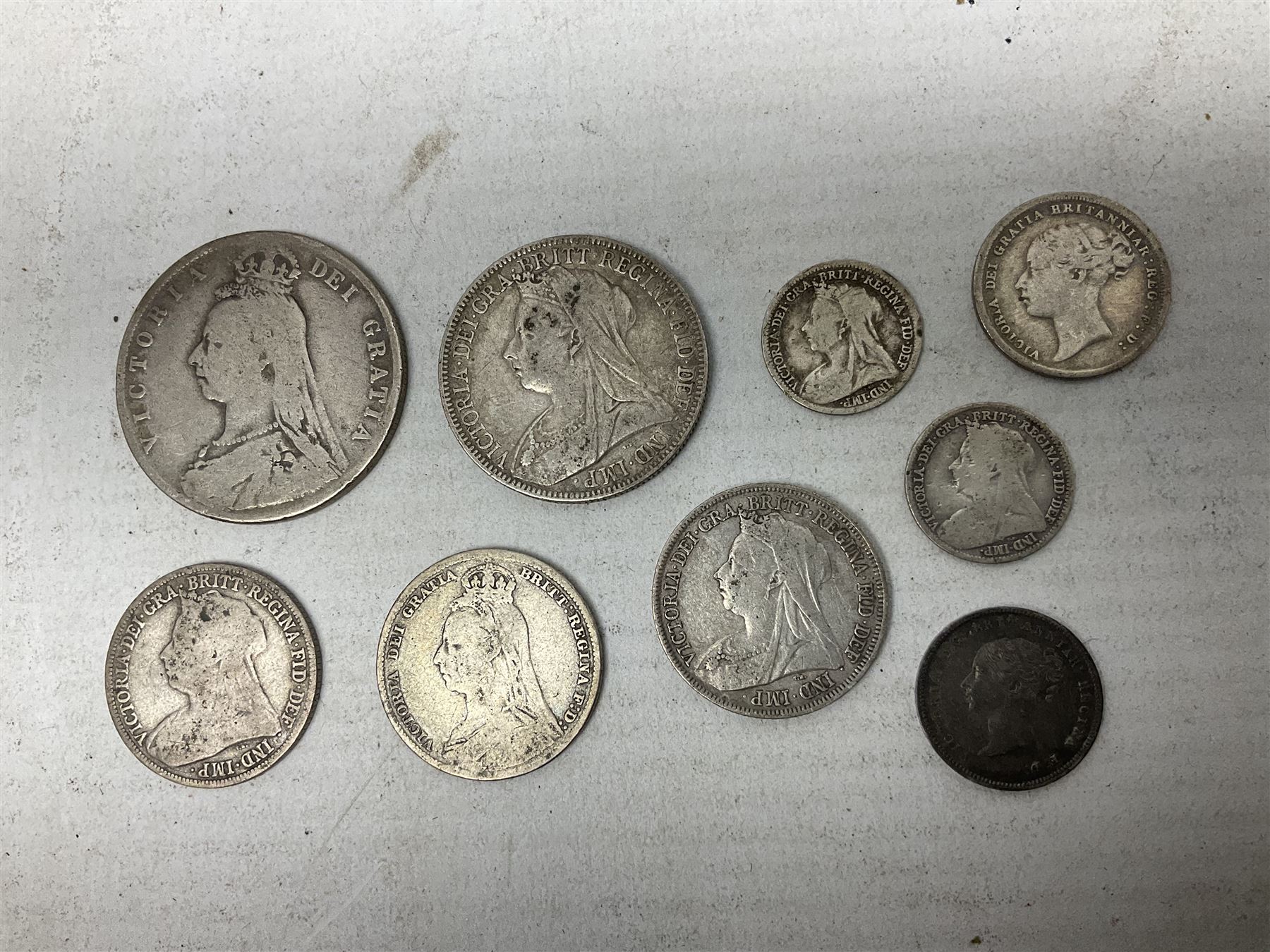 Approximately 120 grams of Great British pre 1920 silver coins, including George III 1819 half crown, William IIII 1834 shilling, Queen Victoria 1892 half crown, various silver threepence pieces etc