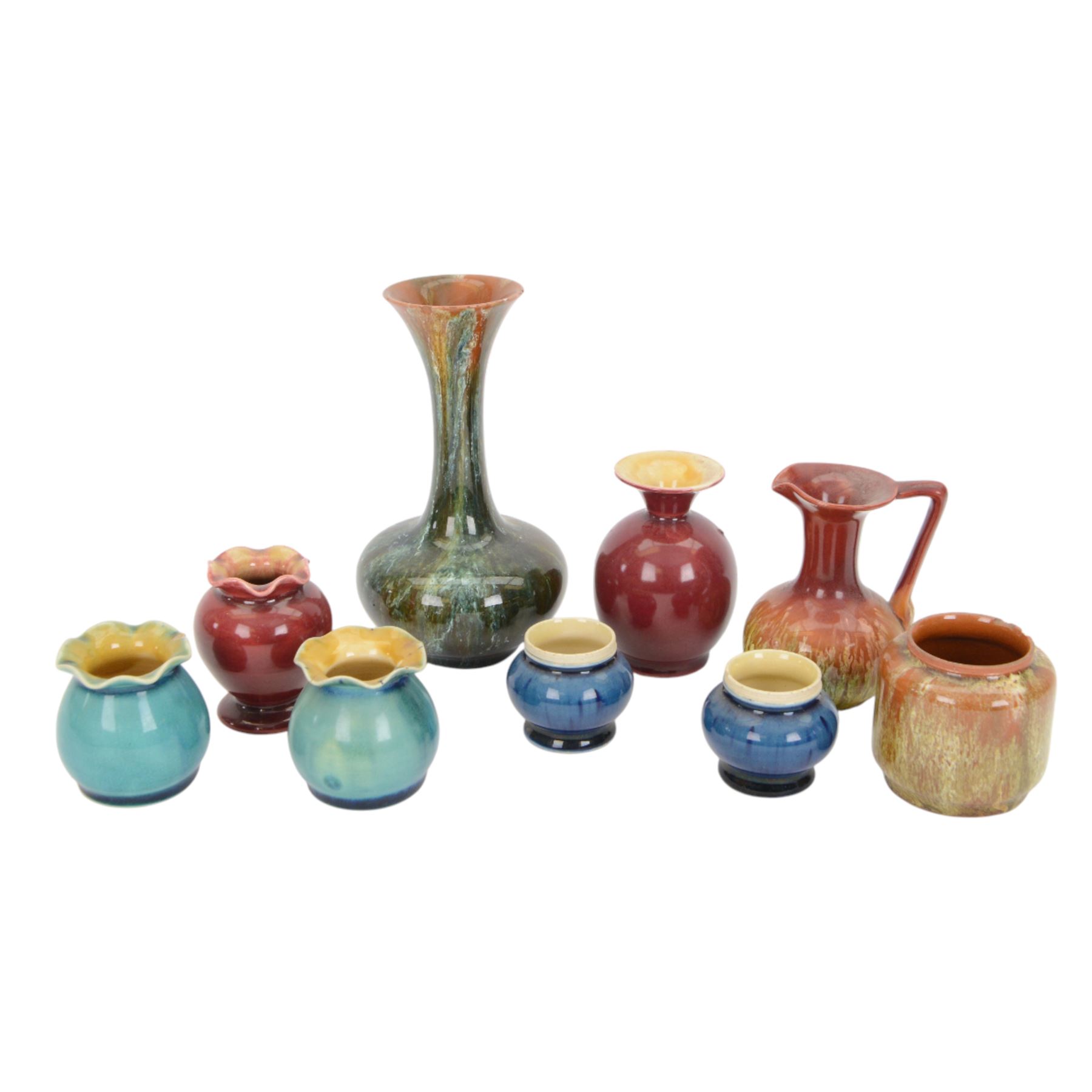 Collection of Linthorpe pottery vases, including pair of vases no 1558, tulip vase 1715 and six others  