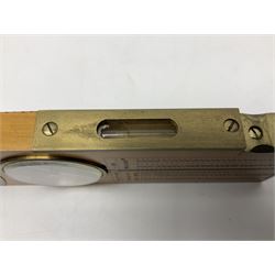 Late 19th/early 20th century boxwood and brass clinometer rule by Stanley, with inset magnetic compass, screw action protractor hinge divided to one degree with rise in inches per yard scale under, spirit level to one edge, marked 'W.F. Stanley Great Turnstile Holborn' with tables of distances, angles and thickness H16cm closed: in original leather covered case with instructions